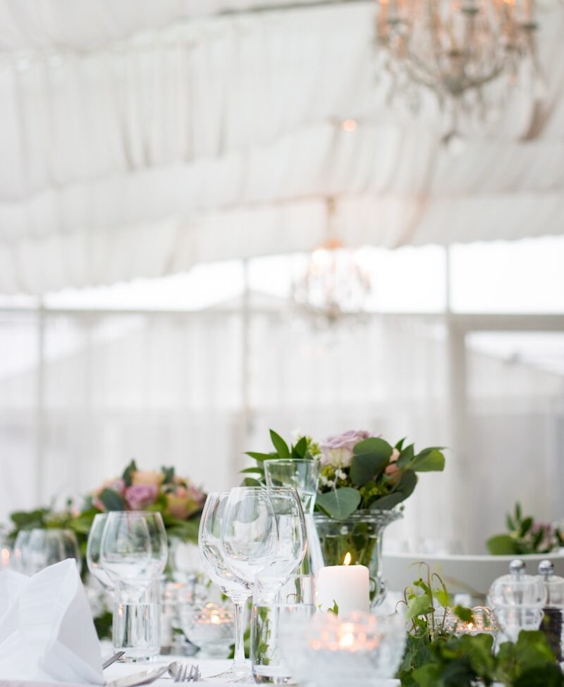 clear long-stem wine glasses on table